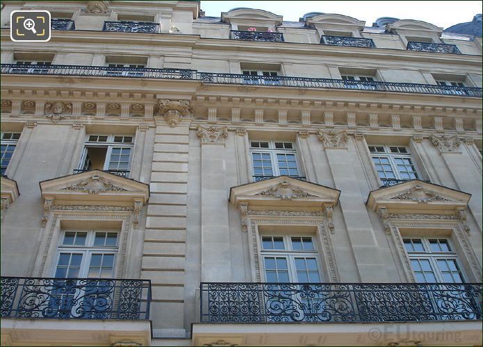 Facades and wrought iron balconies on Champs Elysees
