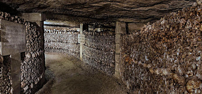 Catacombes de Paris wall of human skulls and bones