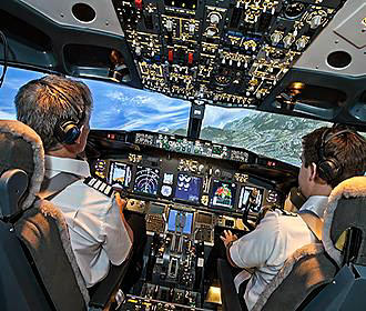 Pilots inside the Boeing flight simulator