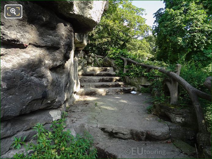 Rock wall with winding stepped path overlooking Jardins du Trocadero