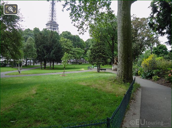 Grass area dotted with trees, Jardins du Trocadero, looking South