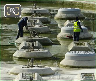 Workers cleaning water fountains in Jardins du Trocadero