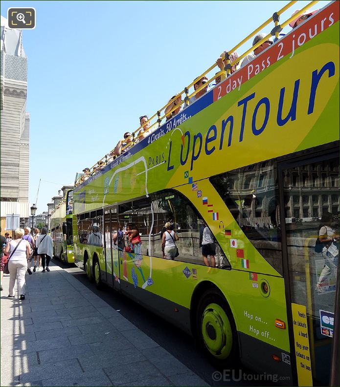 OpenTour bus with flags for audio guide languages avaialable