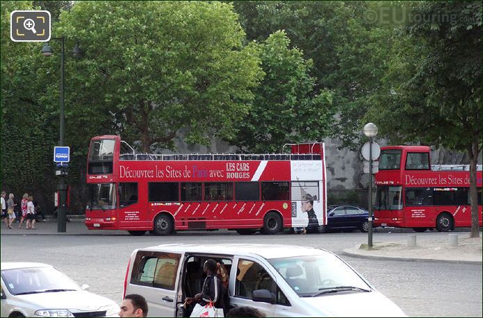 Two red Big Bus Paris Les Car Rouges tour buses