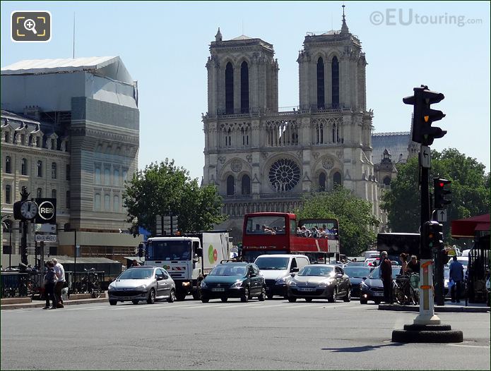 Car Rouges Big Bus Paris at Notre Dame Cathedral
