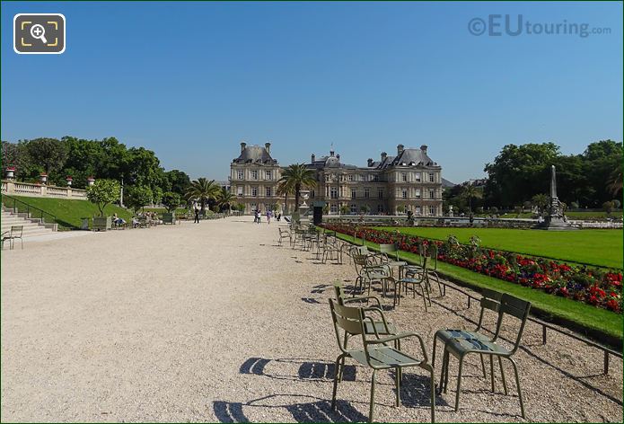 Green chairs and gravel path to Palais du Luxembourg