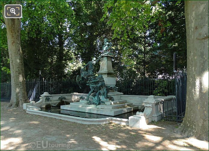 Right side view of Eugene Delacroix Monument and water fountain
