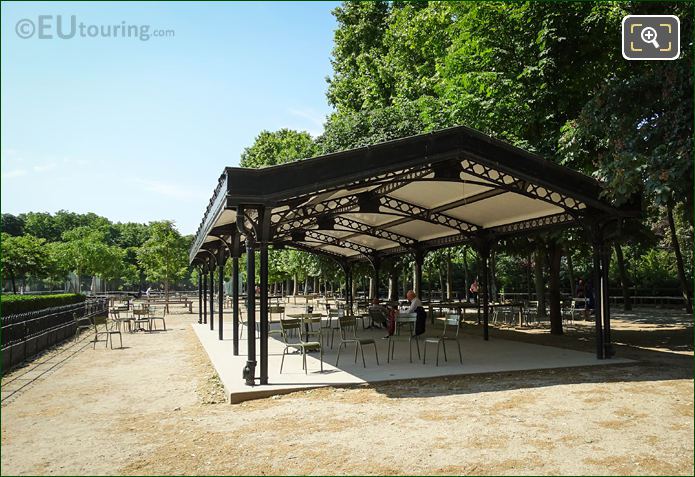 Tables and chairs under Gazebo building in Jardin du Luxembourg