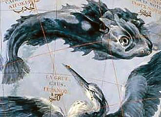 Mythical fish on globe inside Louis XIV museum