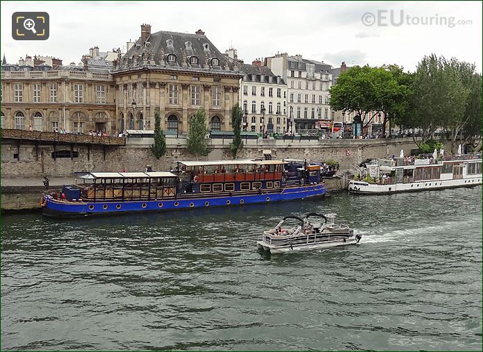 Green River cruise boat on River Seine passing Institut de France