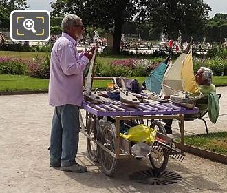 Tuileries Garden vendor repairing model sailing boat