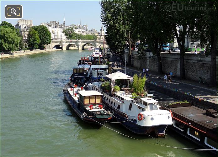 Houseboats moored on River Seine