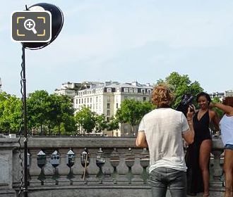 Photographer and photo shoot equipment On Pont Alexandre III