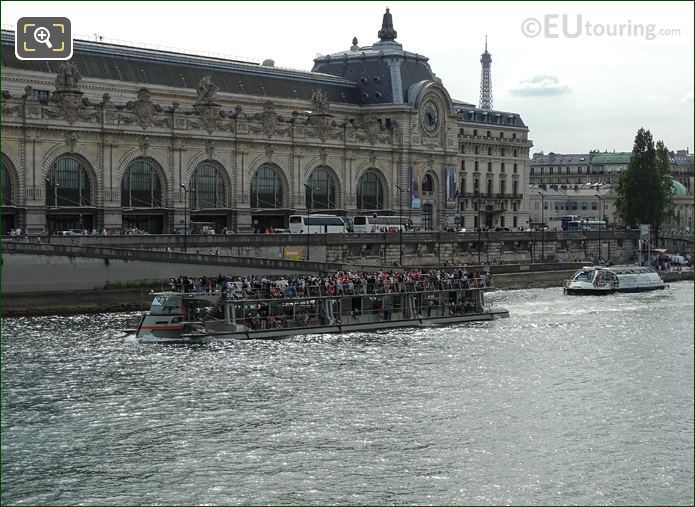 Bateaux Parisiens boat and tourists passing Musee d'Orsay