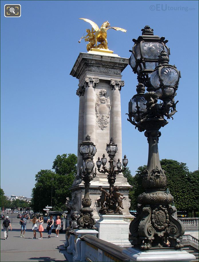 Pont Alexandre III ornamental lamp posts and gilded statue