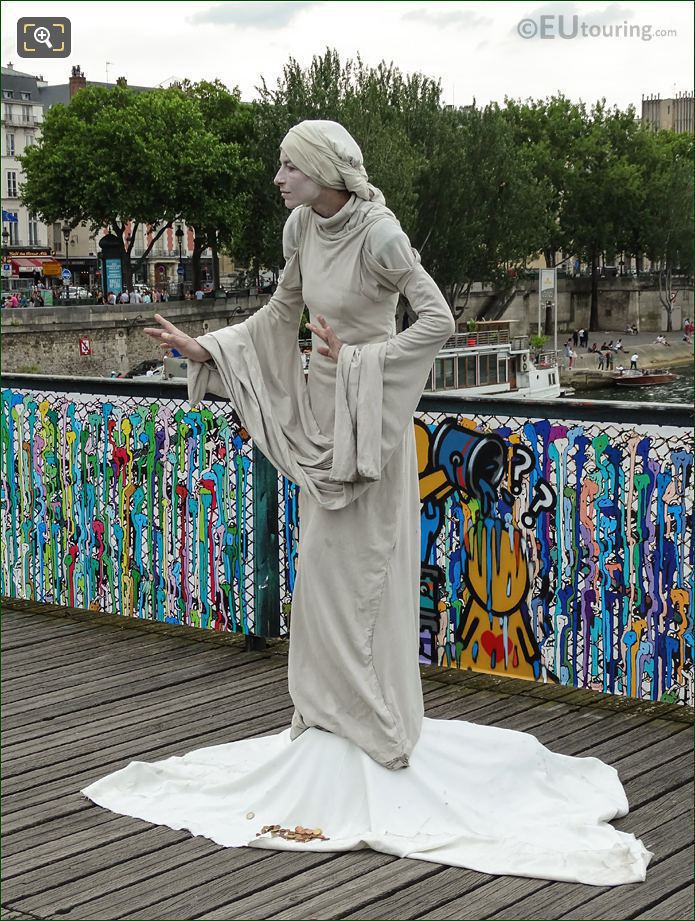 Human statue on Bridge of Love
