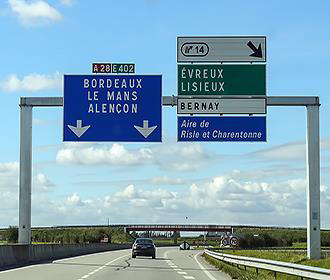 A28 road sign over French road