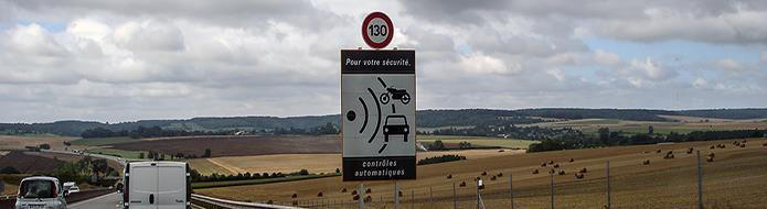 Speed camera sign along French road