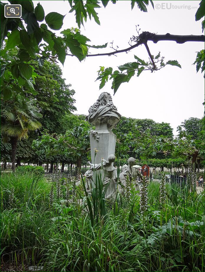Back view of Charles Perrault monument in Tuileries Gardens
