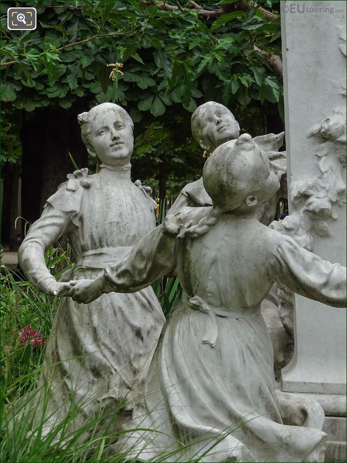 Three children statues on Charles Perrault monument
