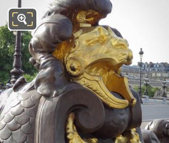 Gilded lions head Pont Alexandre III NW plaque
