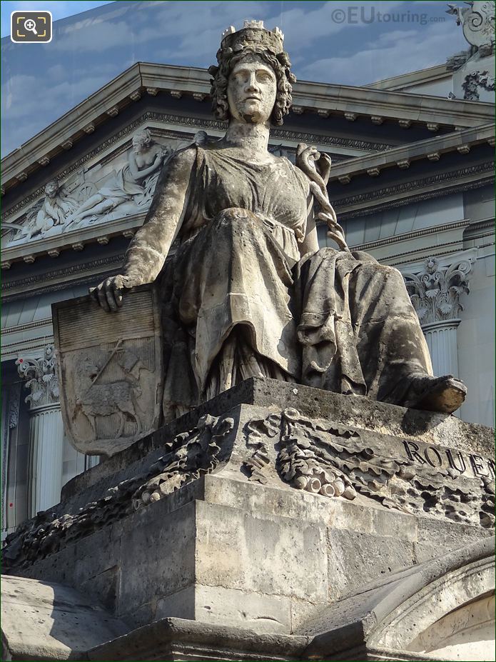 Rouen statue with cadaceus representing wealth
