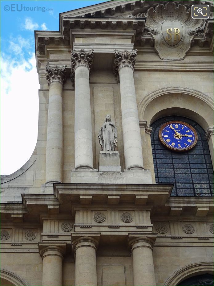 South facade of Eglise Saint-Roch in Paris with Sainte Clotilde statue