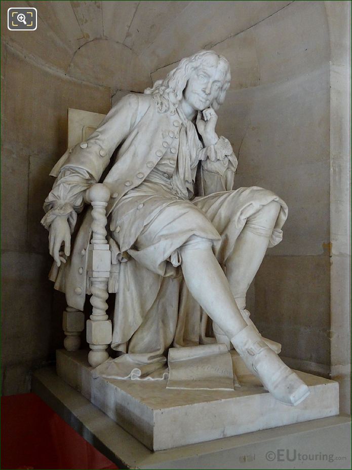Right side of Jean-Baptiste Poquelin statue in Comedie Francaise alcove