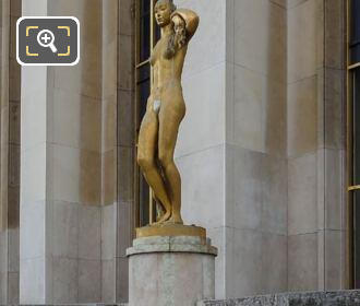 LHS of golden Le Matin statue
