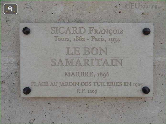 Stone tourist information plaque for Le Bon Samaritain statue