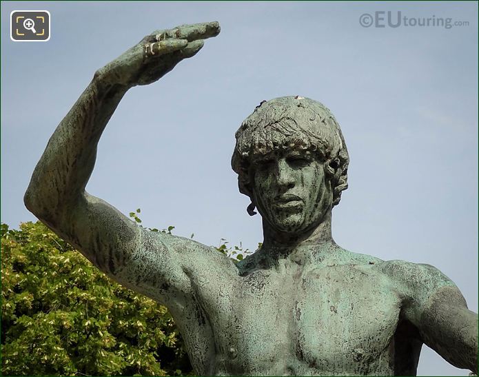 Bronze arm, face of Jabal statue