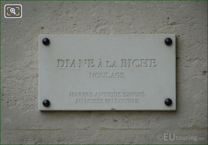 Stone plaque on Diane a la Biche statue
