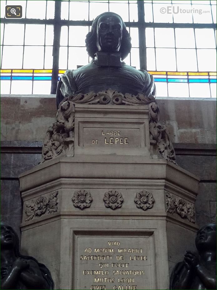 Bronze bust of L'Abbe de L'Epee on monument
