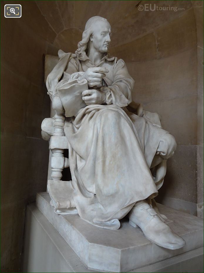 Right side of Pierre Corneille seated statue in Comedie Francaise