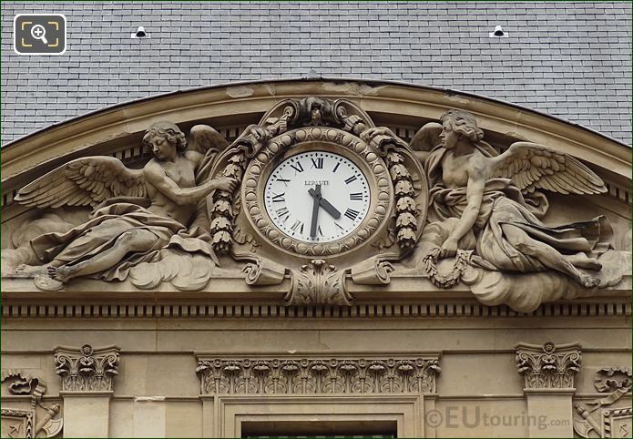 Clock pediment sculpture by French sculptor Augustin Pajou