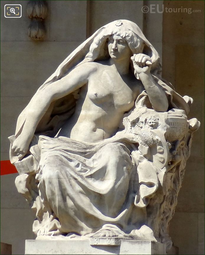 Stone statue at the Grand Palais in Paris