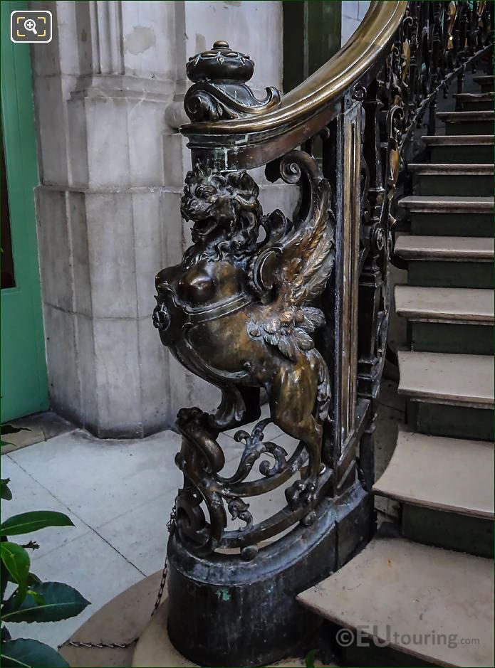 Griffin sculpture on left hand side of Train Bleu staircase