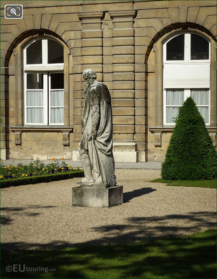 Side view of Le Silence statue by Berthelot in Paris