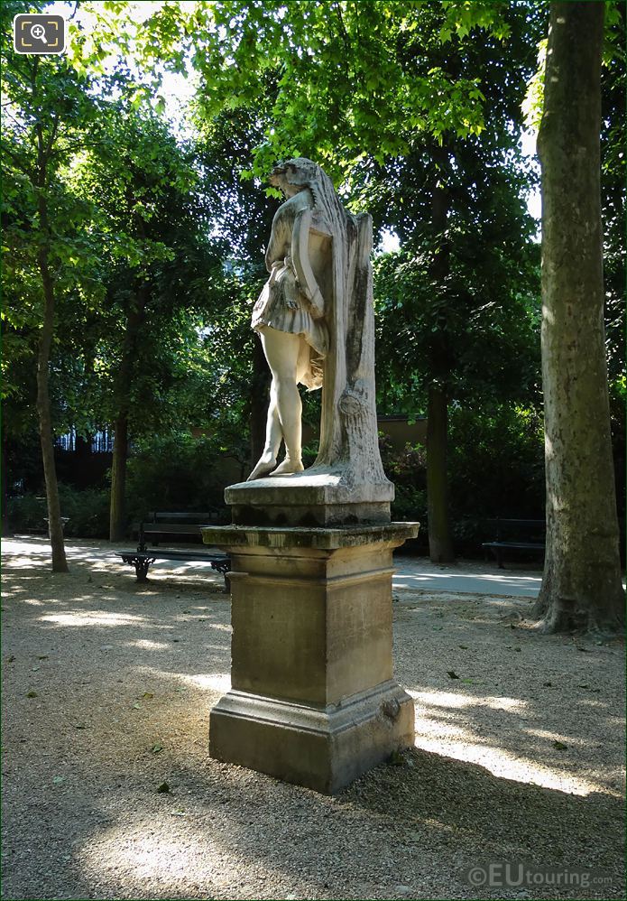 Velleda statue on stone pedestal