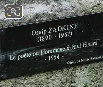 Plaque on Le Poete statue
