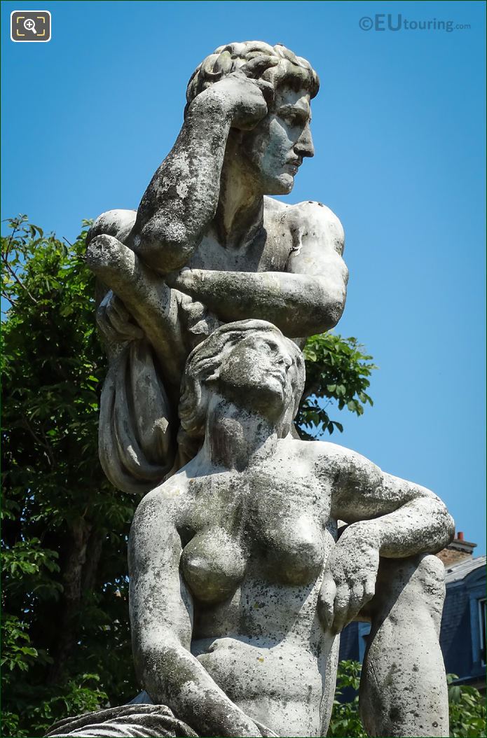 Sculpted man and women on Le Crepuscule statue