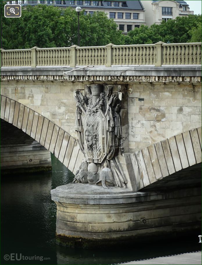 Military trophy sculpture on Pont des Invalides east side