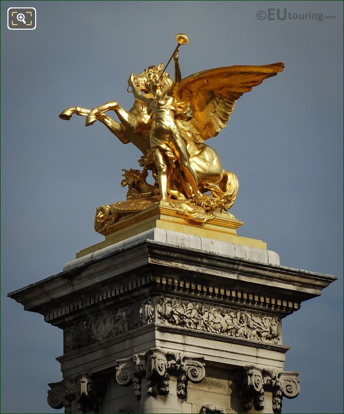 Golden Pegasus held by Fame statue