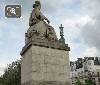 La Ville de Paris statue on its stone base