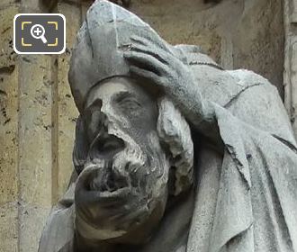 Saint Denis holding head in his hand statue by Louis Desprez