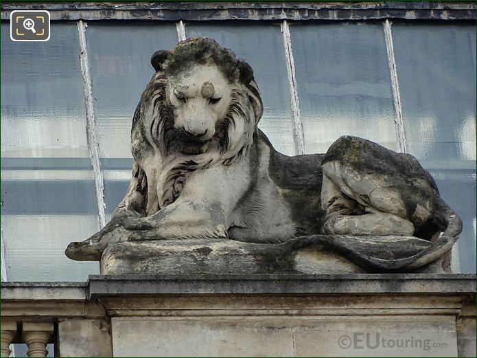 Right side Lion statue, N facade of The Louvre Guichets Lesdiguieres
