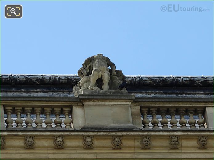 Mer statue on Pavillon des Etats at Musee Louvre