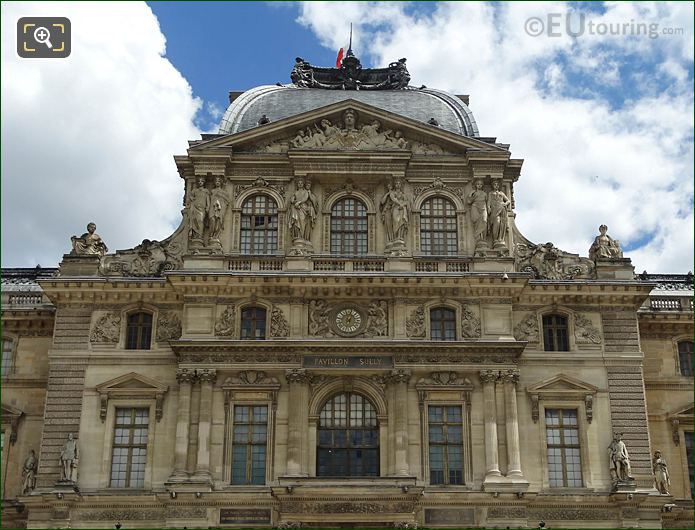 Pavillon Sully facade with La Paix et la Guerre and clock