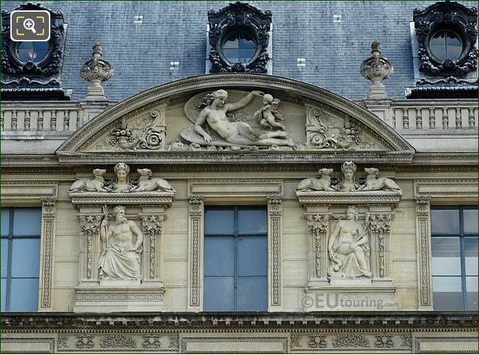 6th window Aile de Marsan facade of The Louvre with bas relief sculptures