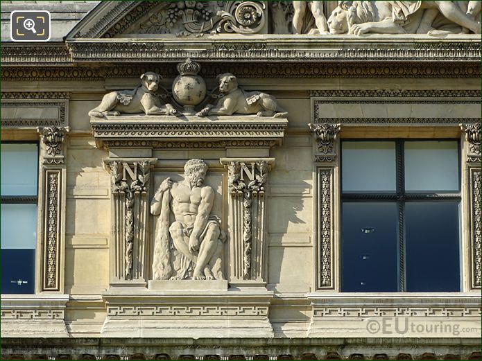 Aile de Flore 7th window left side bas relief sculpture